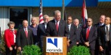 Nixon stood with Noranda officials twice in the last four years to announce major expansion packages. Now those are on hold.